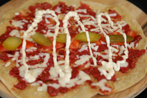 Mano Sujuk With Mozzarella Cheese, Tomato, Pickles And Mayo (USD 4.44)